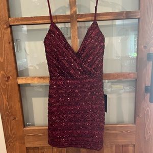 New with tags Homecoming/party dress-short sequin by La Femme color-wine